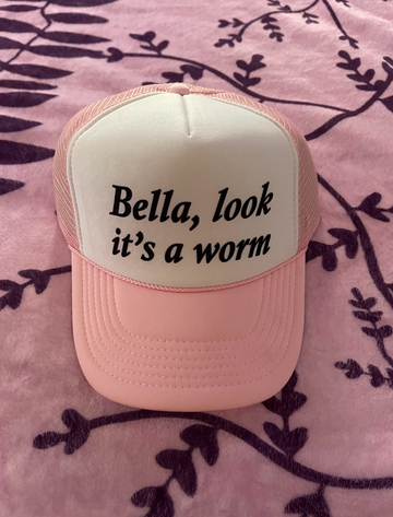 Bella, Look it's a worm Trucker Hat